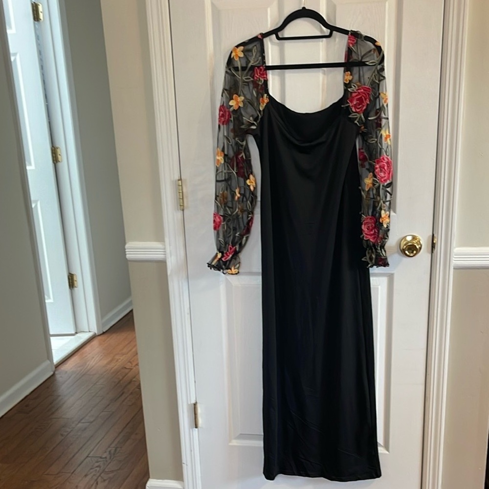 Black fitted dress with sweetheart neckline and floral embroidered sheer sleeves